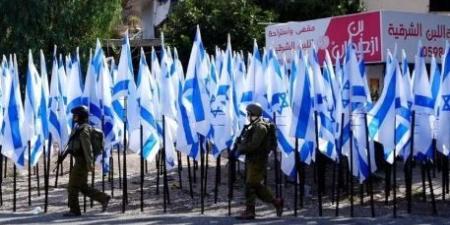 هيئة فلسطينية: حملات رفع أعلام إسرائيل بالضفة تكرس للحضور الاستيطاني
